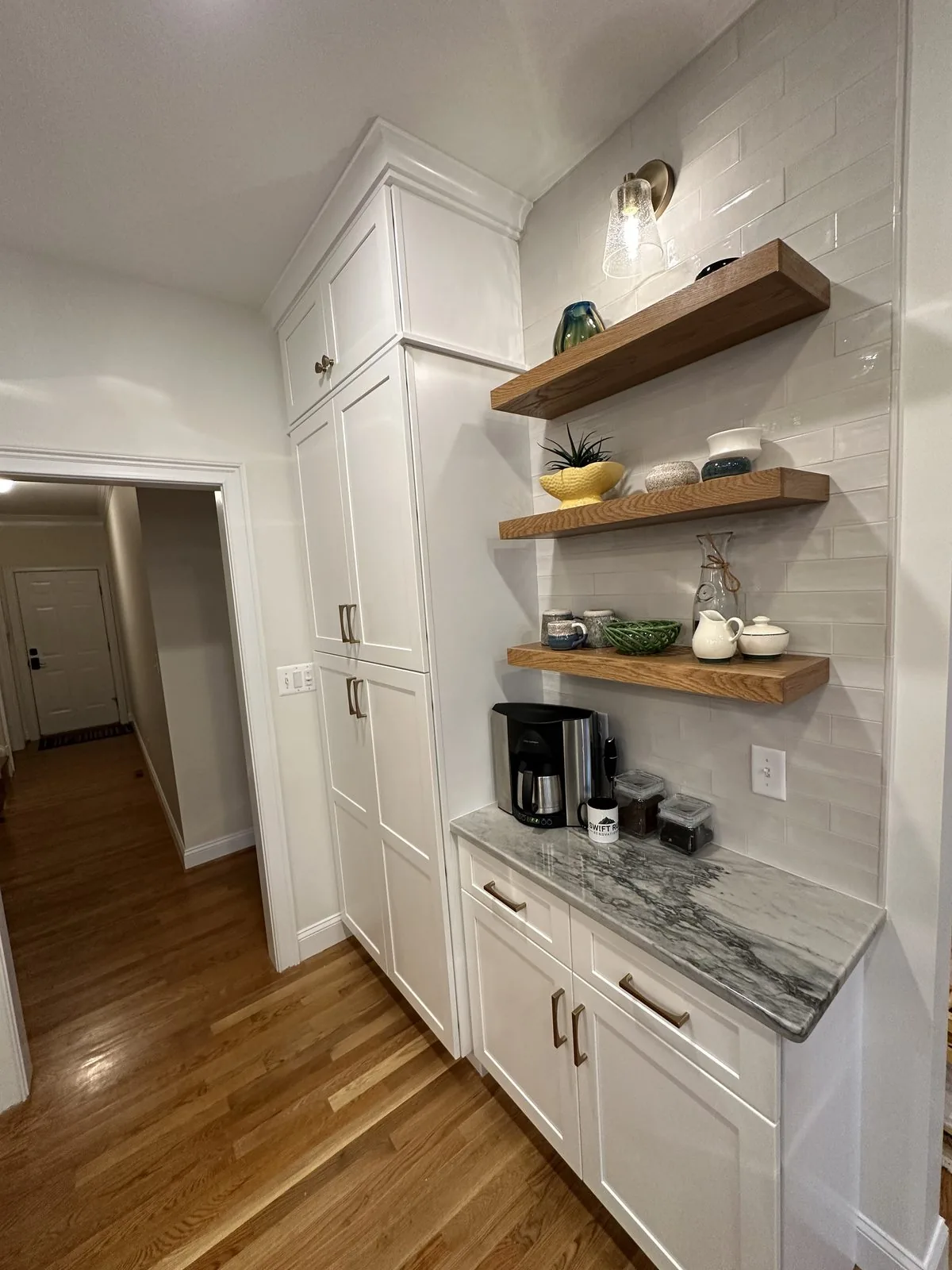 Tile backsplash and open shelving detail in a remodeled kitchen. Brook Road, Richmond, VA