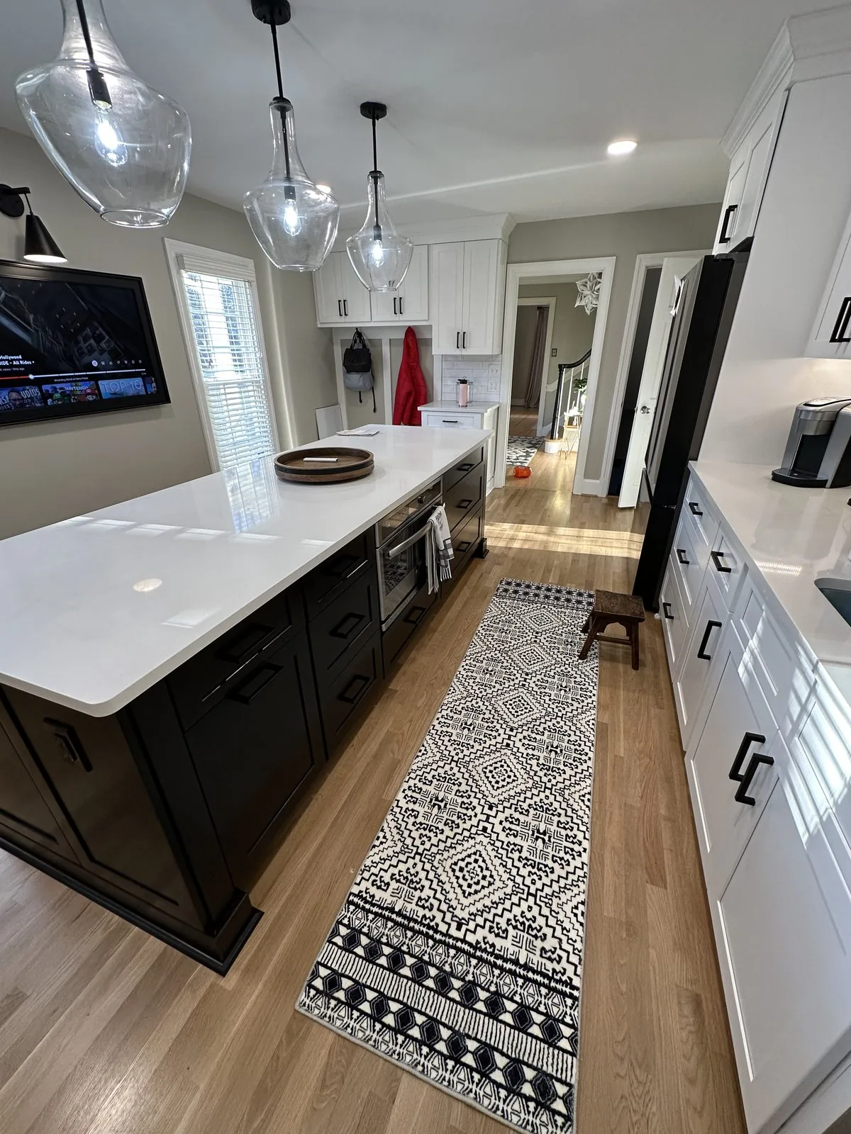 Remodeled kitchen with new cabinetry, countertops, and lighting. Castlebridge, Richmond, VA