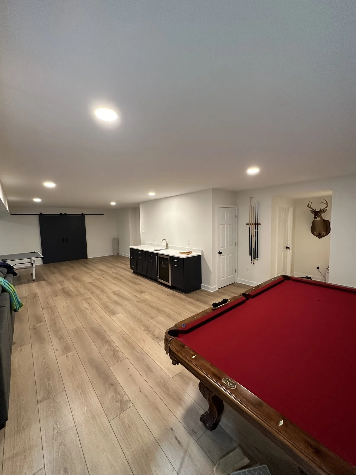 Completed basement finishing detail with fresh paint and trim. Lake Summer Mews, Richmond, VA