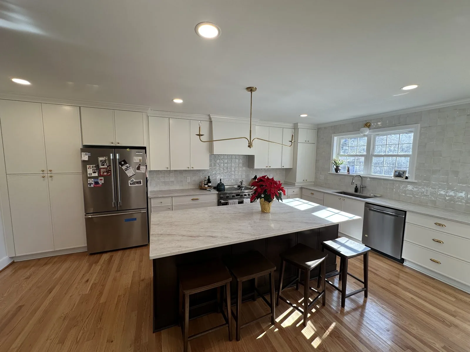 Finished addition kitchen with new cabinetry, island, and hardwood floors. Park Avenue, Richmond, VA