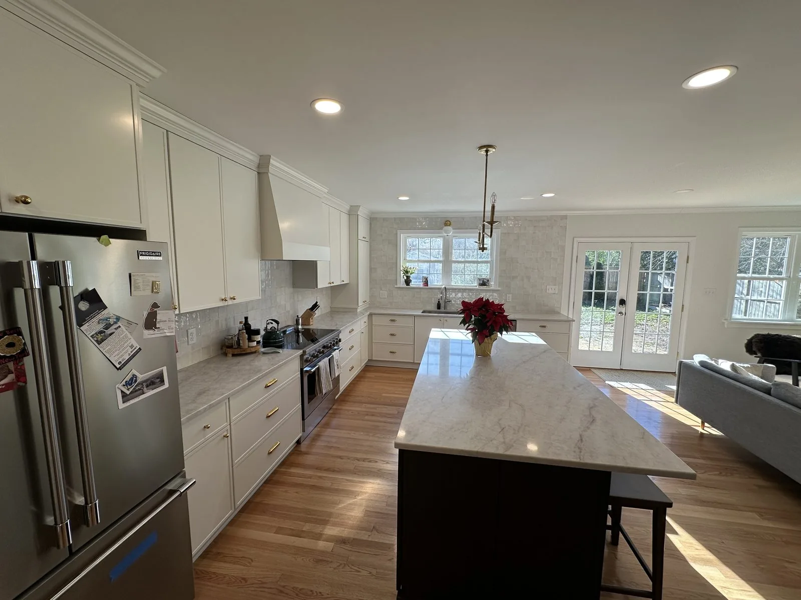 Finished home addition with open kitchen, living space, and new french doors. Park Avenue, Richmond, VA